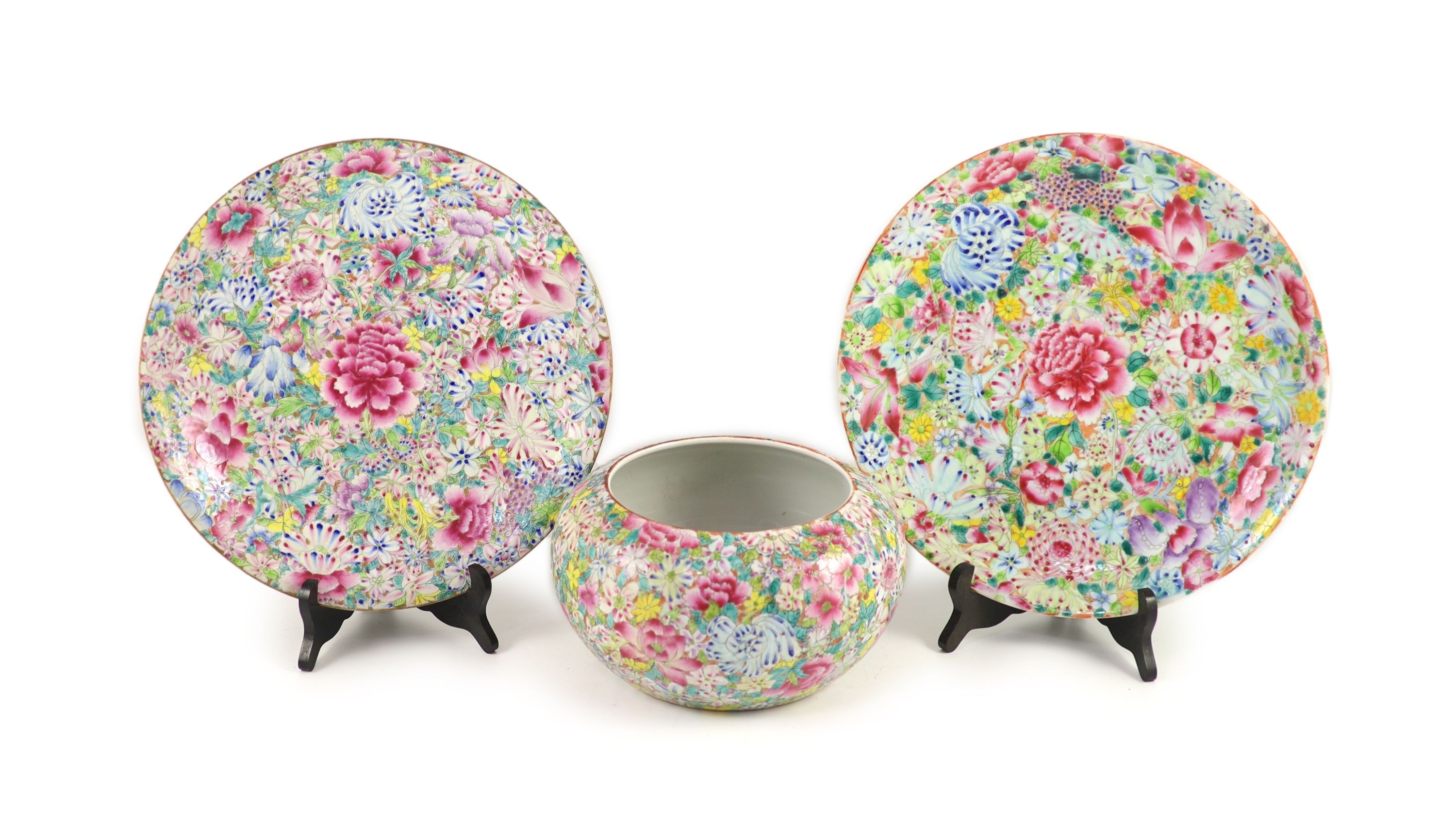 A near pair of Chinese famille rose’millefleur’ dishes and a similar alms bowl, Republic period, Dishes 32.5 and 33.5 cm diameter, bowl 24 cm diameter